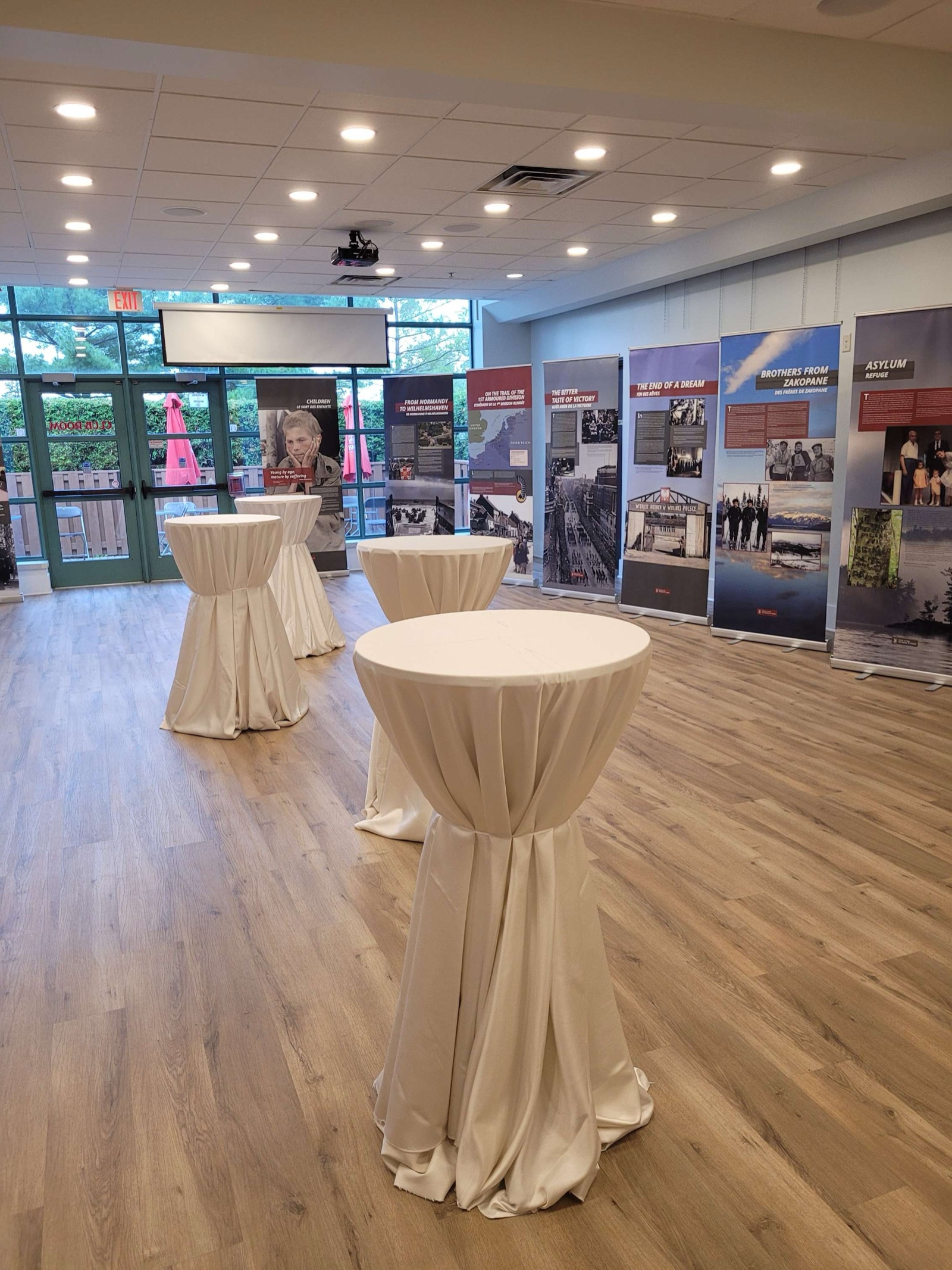 Exhibit and cocktail tables in the Club Room