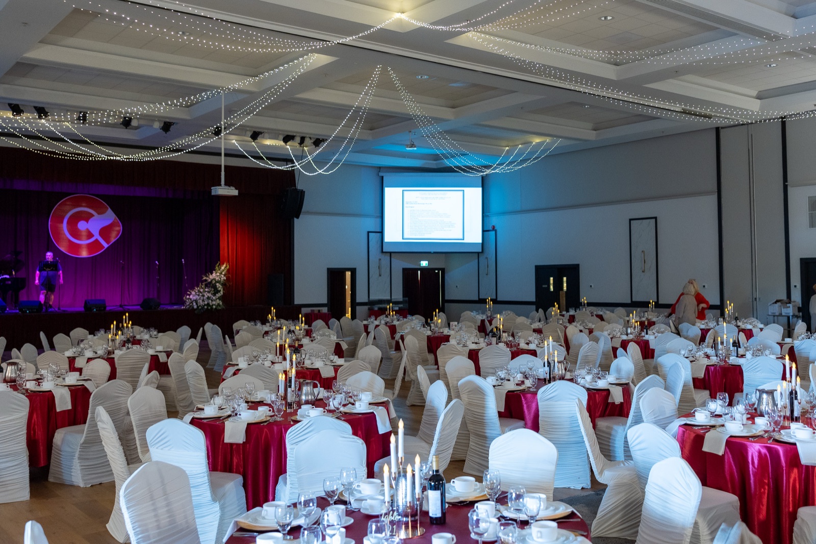 Red and white banquet setting in the Great Hall